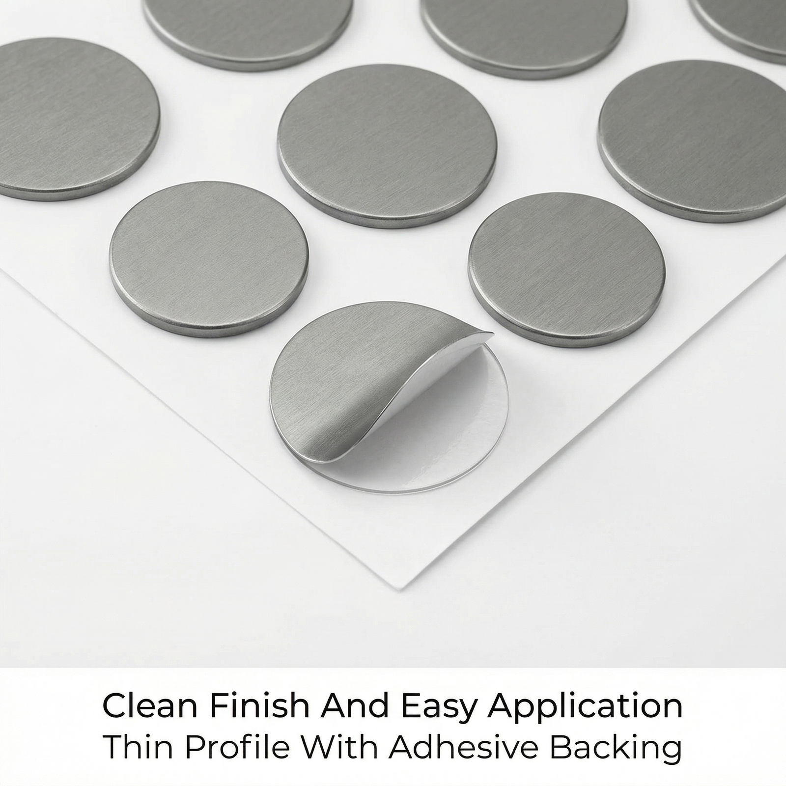 Furniture screw hole covers with self-adhesive wood grain finish