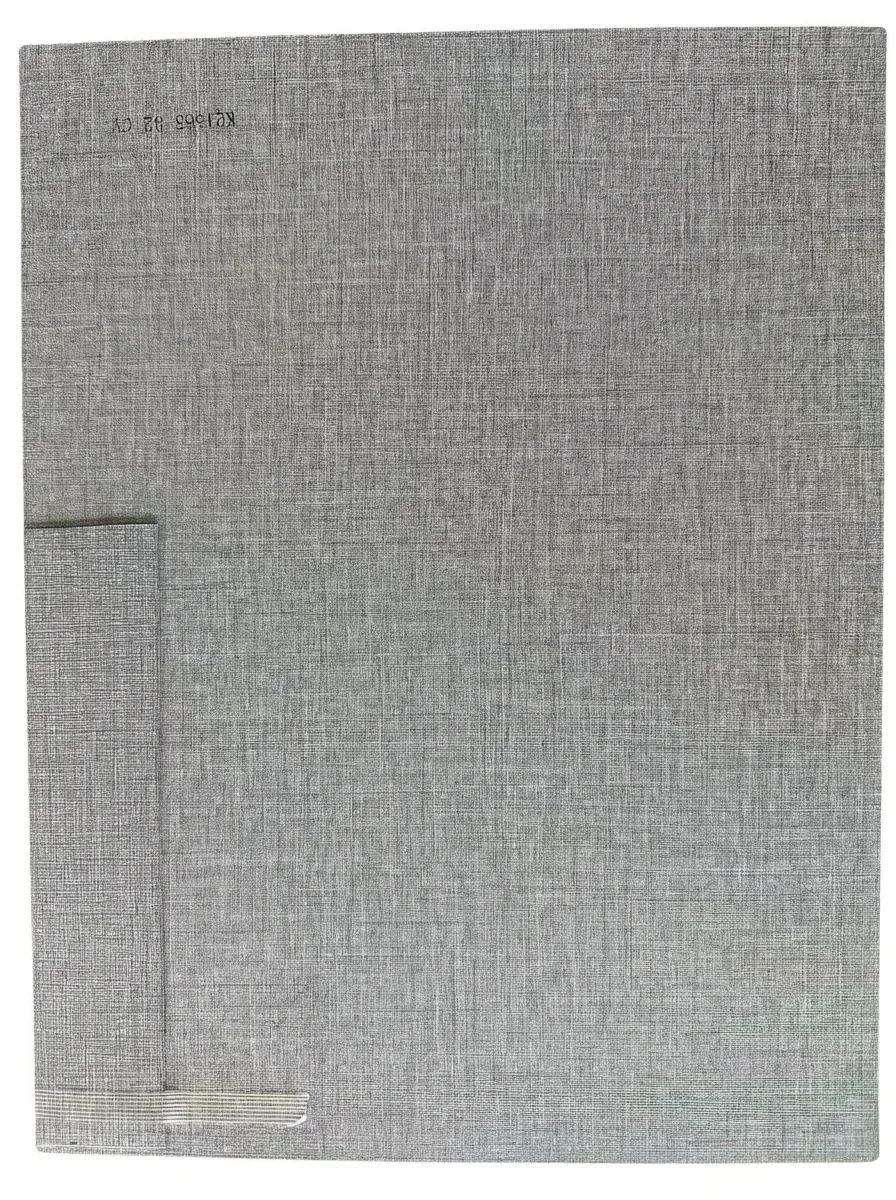 Fujuan K21565 medium grey woven textile effect edge banding, seamlessly matching fabric-faced furniture boards and modern cabinetry.