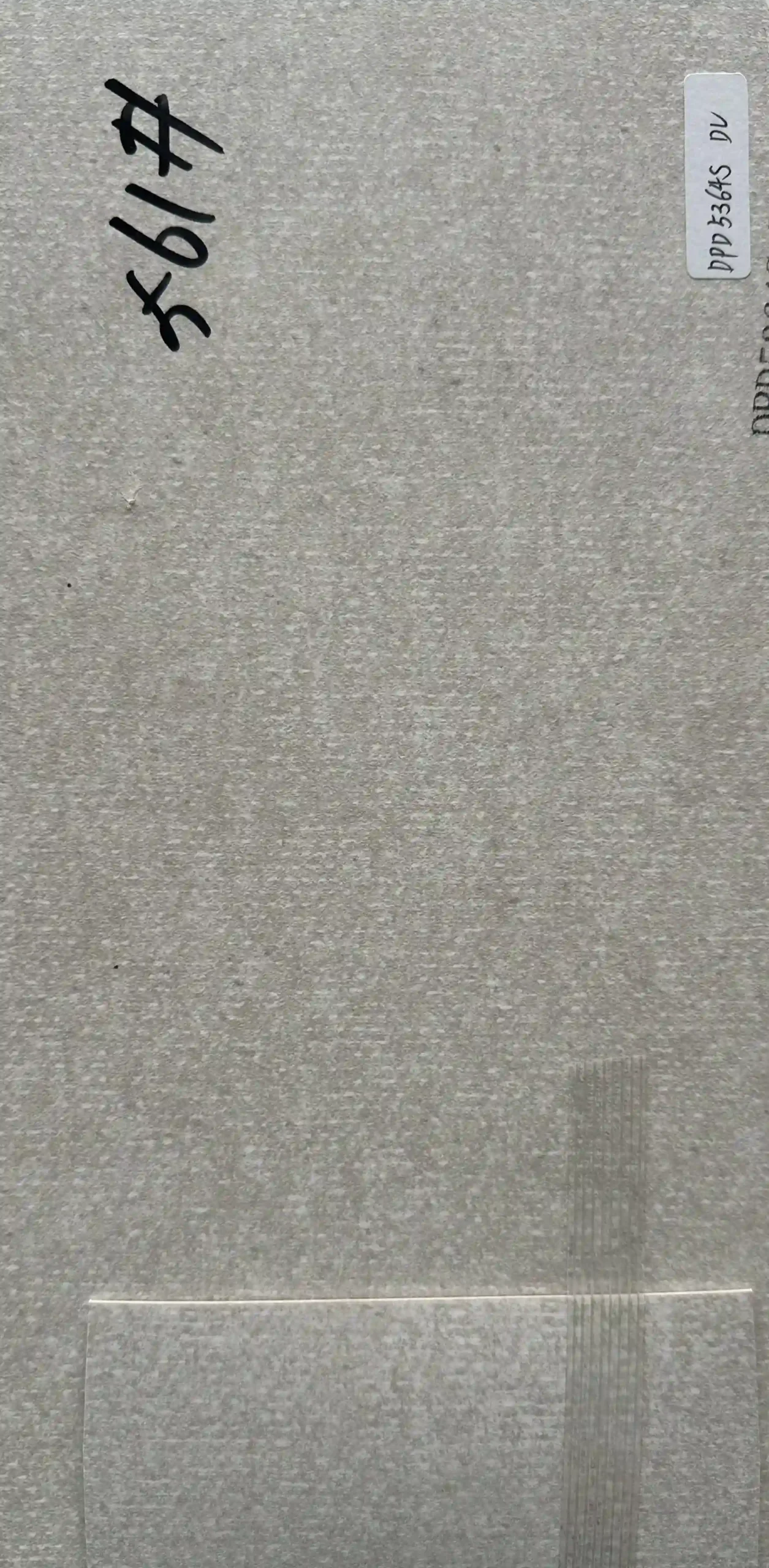 Grey linen board sample with matching edge banding strip for custom furniture projects DPD53619 DV