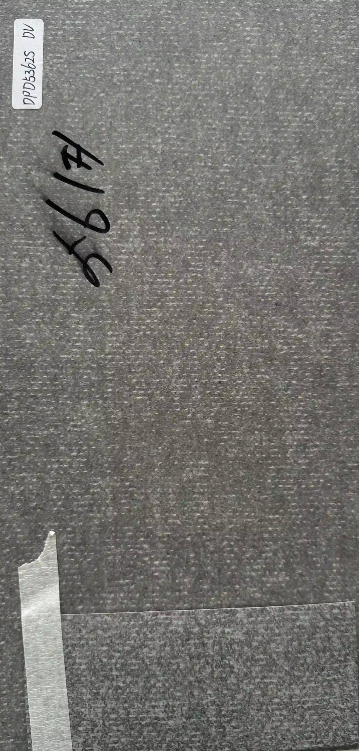 Dark grey linen board sample with matching edge banding strip for cabinet and panel orders DPD53625 DV