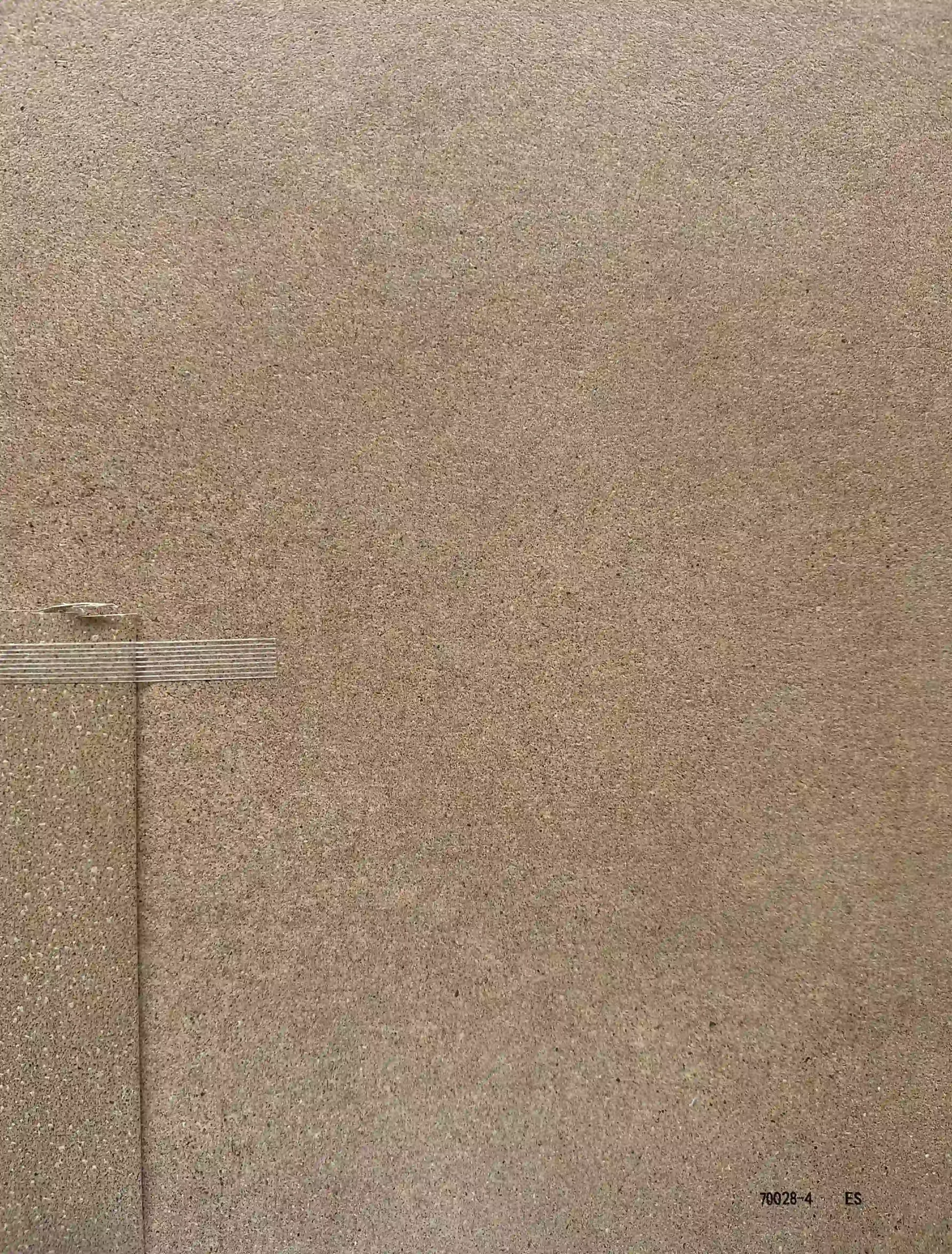 Sandy stone board sample with matching edge banding strip for custom furniture and cabinet panels 70028 4 ES