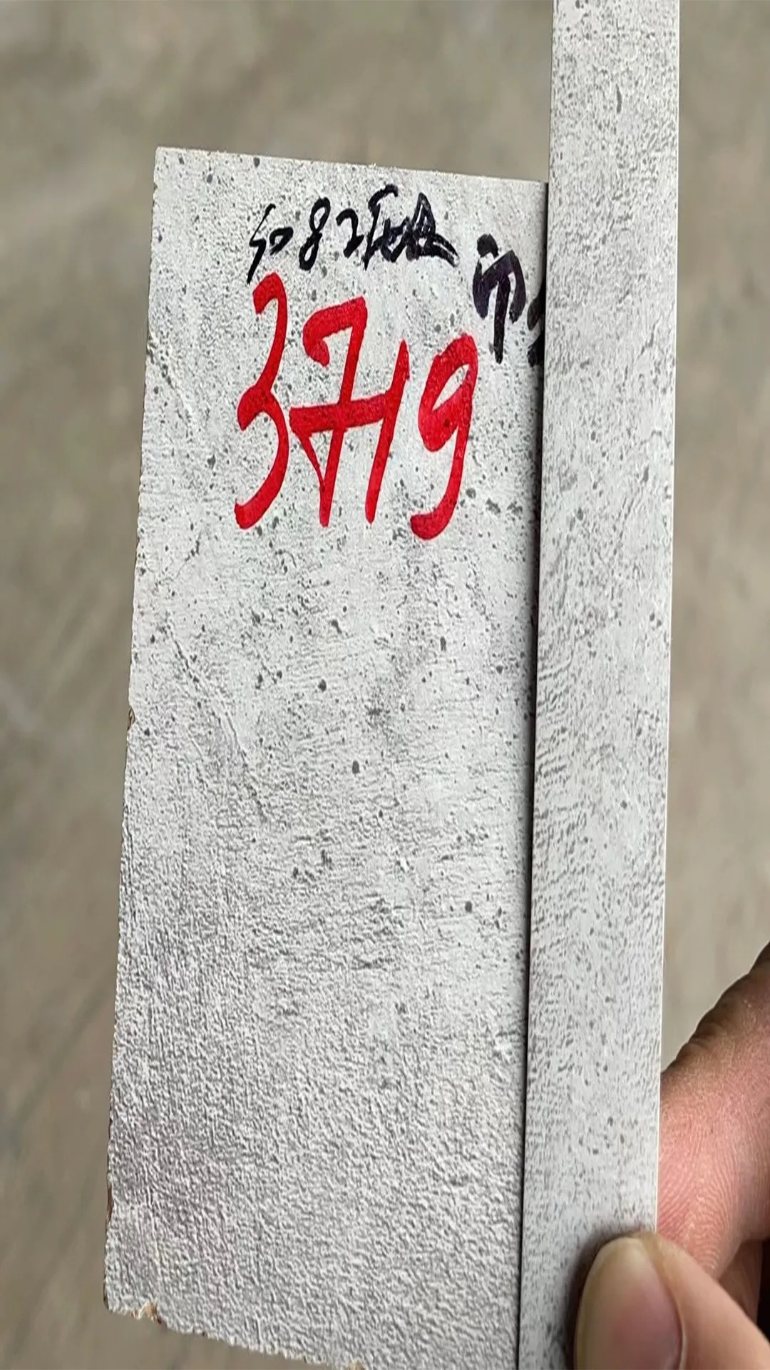 Fujuan 3719 light grey concrete and micro-cement texture edge banding, matching industrial and minimalist furniture boards.
