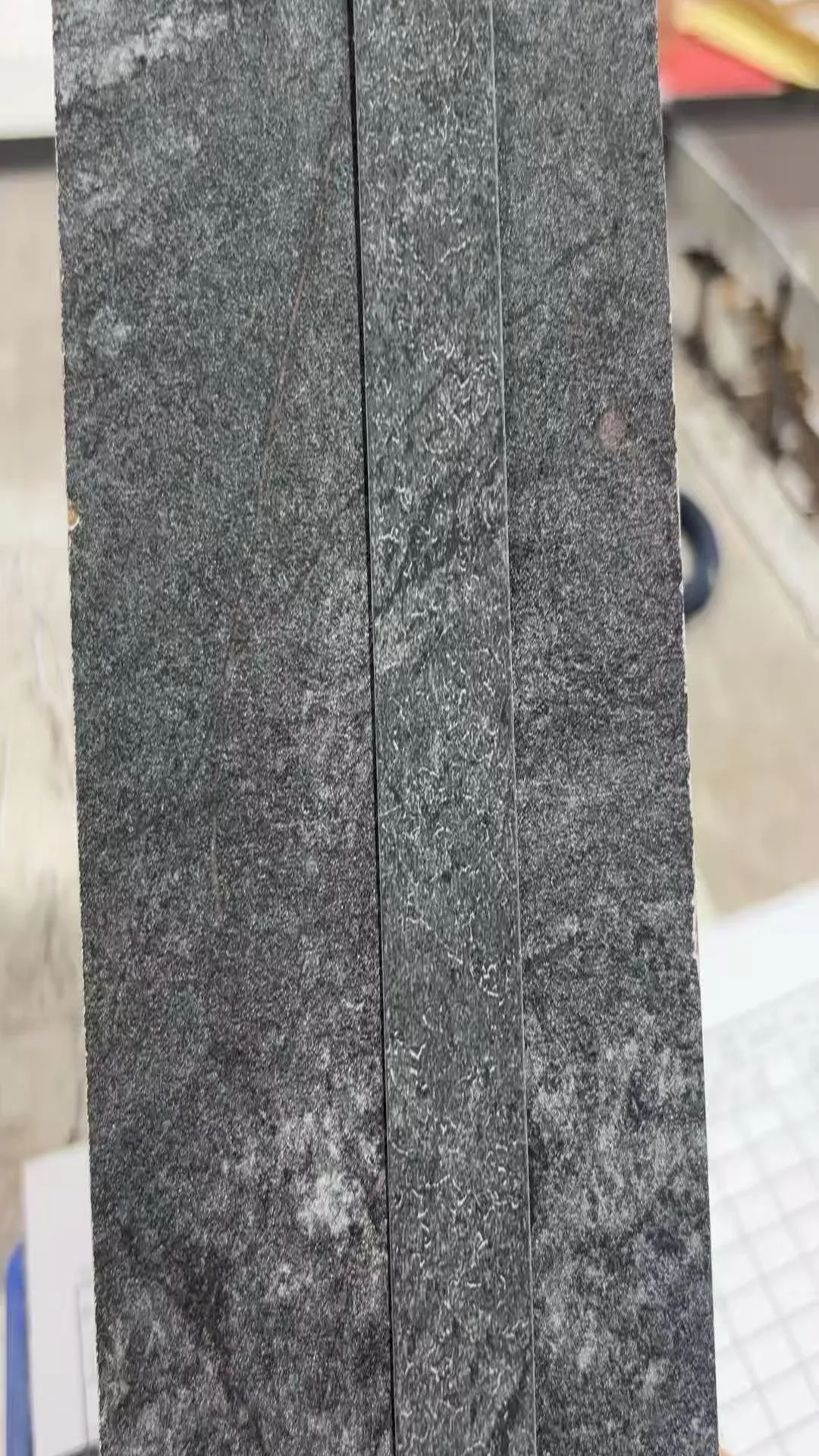 Fujuan dark grey slate and obsidian stone texture edge banding for premium kitchen countertops and sintered stone furniture.