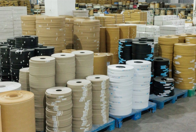 PVC edge banding rolls stored in factory warehouse for bulk production and export supply